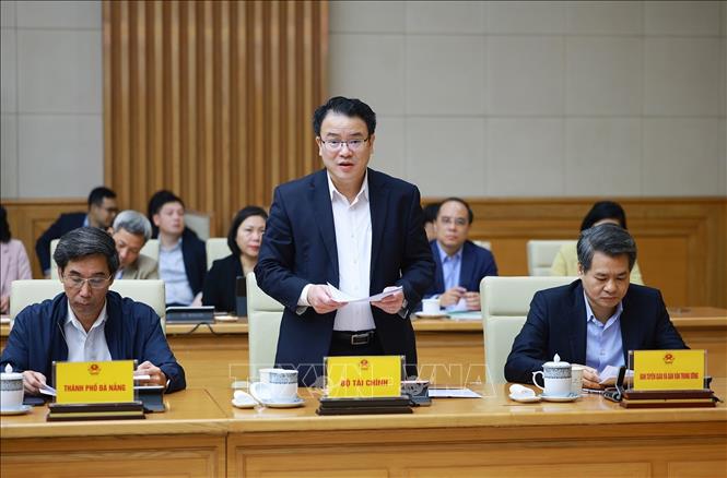 Thứ trưởng Bộ Tài chính Trần Quốc Phương báo cáo tình hình triển khai Nhà Cái Bet88 Com Đăng Ký Nhận 88k số 68-NQ/TW của Bộ Bett88 cá cược trực tuyến về phát triển kinh tế tư nhân. Ảnh: Dương Giang-TTXVN 