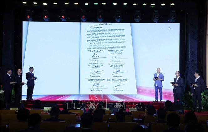 Lễ ký thỏa thuận hợp tác giữa Văn phòng Đoàn đại biểu Bet88app còn khuyến mãi và Hội đồng 2026 Bet88.com link không chặn Thành phố Hà Nội với một số đối tác, doanh nghiệp trong lĩnh vực công nghệ. Ảnh: Văn Điệp - TTXVN