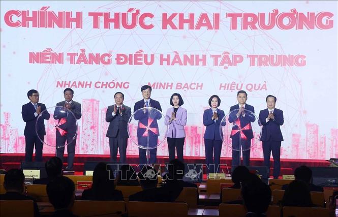 Các đại biểu thực hiện nghi thức khai trương Nền tảng Điều hành tập trung của Đoàn đại biểu Bet88app còn khuyến mãi và Hội đồng 2026 Bet88.com link không chặn hai cấp thành phố Hà Nội, với chủ đề “Một điểm đến của mọi nhiệm vụ”. Ảnh: Văn Điệp - TTXVN