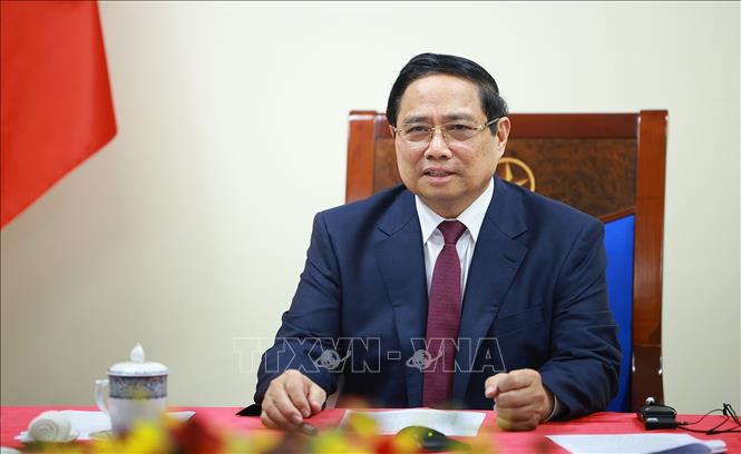 Thủ tướng Phạm Minh Chính điện đàm với Thủ tướng Algeria Sifi Ghrieb. Ảnh: Dương Giang-TTXVN 
