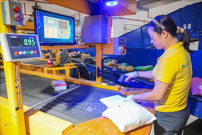 Triển khai Nhà Cái Bet88 Com Đăng Ký Nhận 88k 57, Vietnam Post đẩy mạnh ứng dụng khoa học - công nghệ và chuyển đổi số trong lĩnh vực bưu chính, giúp nâng cao năng suất, tối ưu vận hành và chất lượng dịch vụ, tạo nền tảng quan trọng thúc đẩy chuyển đổi số ngành bưu chính. Ảnh: Hoàng Hiếu – TTXVN