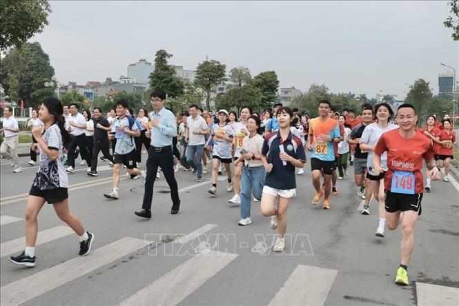 Bet888 football, VĐV tham gia chạy hưởng ứng. Ảnh: Minh Quyết - TTXVN