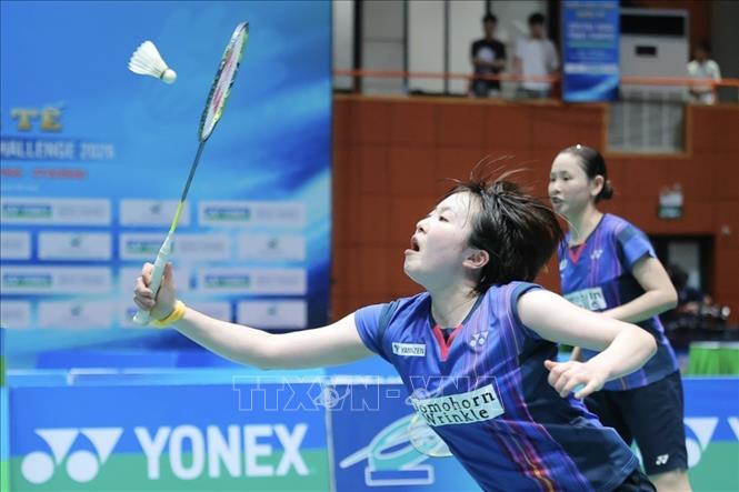 Cặp VĐV Somerville (Australia) - Josephine Wu (Canada) thắng Miki Kanehiro - Yuna Kato (Nhật Bản) 2-1 trước đối thủ, giành HCV. Ảnh: Minh Quyết - TTXVN