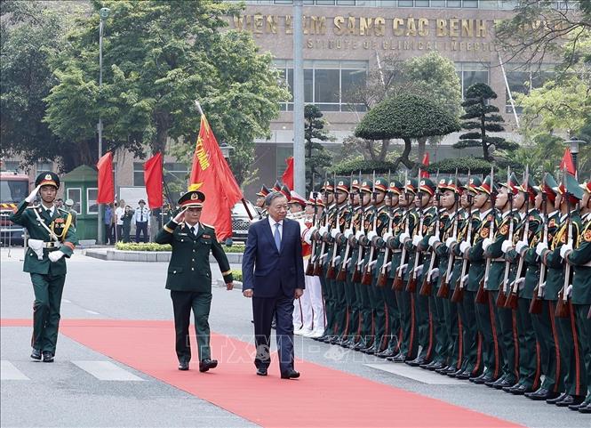 Lễ đón Bet8801234.com cá cược độc quyền Tô Lâm, Bí thư Quân ủy Trung ương đến dự lễ kỷ niệm. Ảnh: Thống Nhất – TTXVN