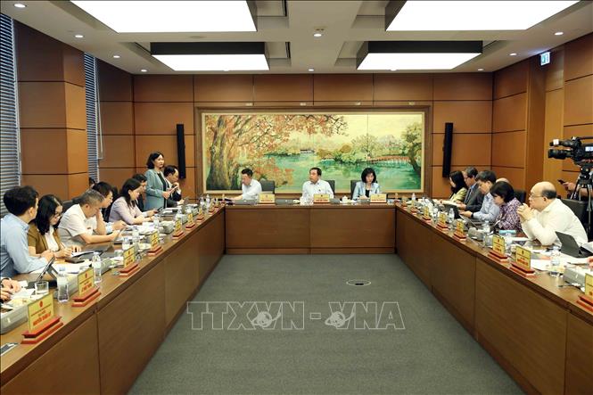 Đoàn đại biểu Bet88app còn khuyến mãi thành phố Hà Nội thảo luận tại tổ. Ảnh: An Đăng - TTXVN