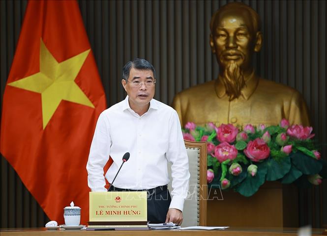 Thủ tướng Lê Minh Hưng chủ trì cuộc họp với các bộ, ngành và các cơ quan liên quan về cắt giảm thủ tục hành chính, điều kiện kinh doanh. Ảnh: Dương Giang - TTXVN
