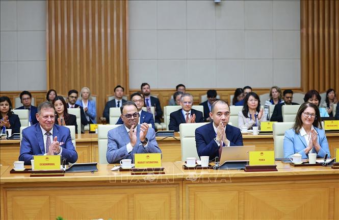 Đoàn doanh nghiệp cấp cao Hội đồng Kinh doanh Hoa Kỳ - ASEAN (USABC) tham dự buổi tiếp và làm việc với Thủ tướng Lê Minh Hưng. Ảnh: Dương Giang – TTXVN
