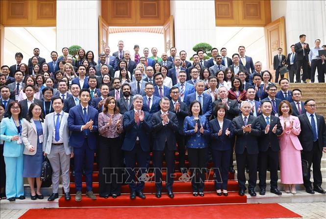 Thủ tướng Lê Minh Hưng với Đoàn doanh nghiệp cấp cao Hội đồng Kinh doanh Hoa Kỳ - ASEAN (USABC). Ảnh: Dương Giang – TTXVN
