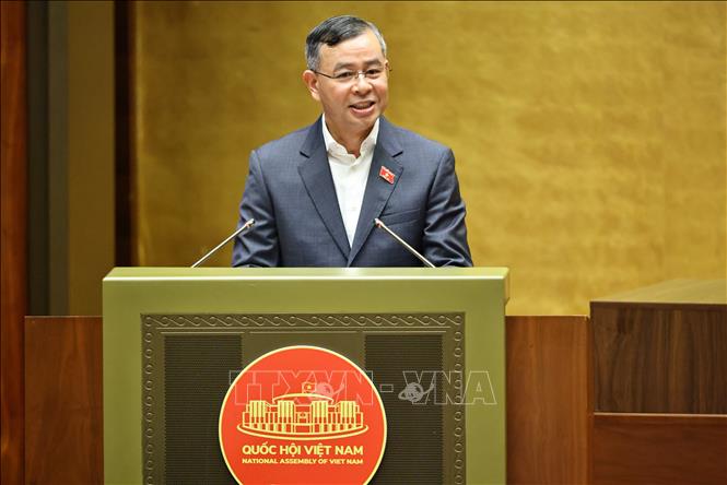 Bộ trưởng Bộ Tài chính Ngô Văn Tuấn giải trình, làm rõ một số vấn đề đại biểu Bet88app còn khuyến mãi nêu. Ảnh: Minh Đức - TTXVN