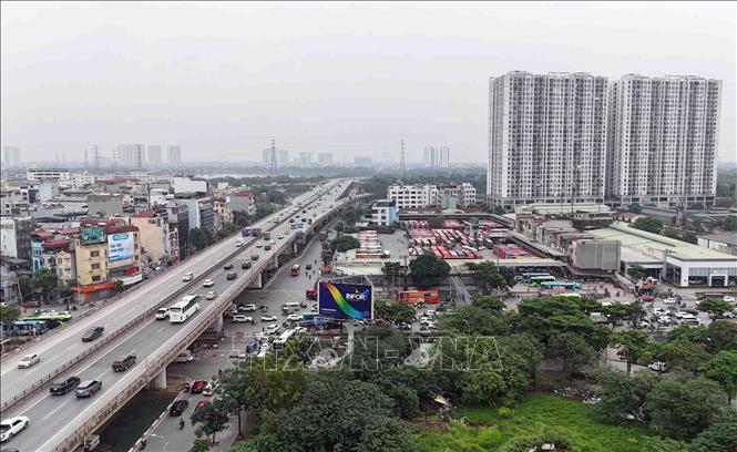 Dù tuyến đường Giải Phóng tập trung hai bến xe lớn là Nước Ngầm và Giáp Bát nhưng lượng phương tiện đổ về không tăng đột biến so với ngày thường. Ảnh: Phạm Kiên - TTXVN