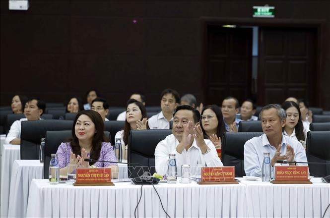 Các đại biểu tham dự buổi làm việc. Ảnh: Thống Nhất - TTXVN