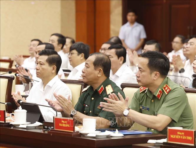 Các đại biểu tham dự buổi làm việc. Ảnh: Thống Nhất – TTXVN