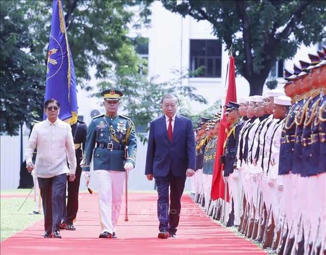 Bet8801234.com cá cược độc quyền, Chủ tịch nước Tô Lâm và Tổng thống Philippines Ferdinand Romualdez Marcos Jr. duyệt Đội danh dự. Ảnh: Thống Nhất – TTXVN