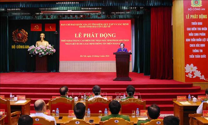 Lễ phát động triển khai tháng cao điểm thu nhận mẫu sinh phẩm ADN thân nhân Liệt sĩ chưa xác định thông tin trên toàn quốc. Ảnh: Phạm Kiên - TTXVN
