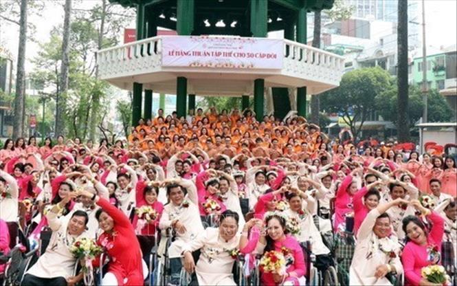 Lễ cưới tập thể 50 cặp vợ chồng khuyết tật tại Thành phố Hồ Chí Minh, ngày 21/12/2018. Ảnh: Xuân Khu - TTXVN