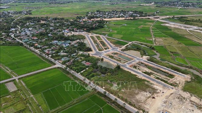 Khu tái định cư dự án đường sắt tốc độ cao ở Tổ dân phố Liên Vinh được xây dựng liền kề với khu dân cư hiện tại, giúp người dân thuận lợi trong quá trình di dời đến nơi ở mới. Ảnh: Hữu Quyết - TTXVN