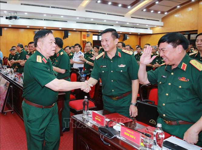 Đại tướng Nguyễn Trọng Nghĩa, Ủy viên Bộ Bett88 cá cược trực tuyến, Bí thư Trung ương Đảng, Chủ nhiệm Tổng cục Bett88 cá cược trực tuyến QĐND Việt Nam với các đại biểu. Ảnh: Trọng Đức - TTXVN
