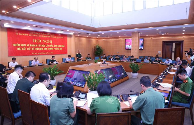 Hội nghị triển khai Kế hoạch lấy mẫu, bàn giao mẫu hài cốt liệt sĩ phục vụ giám định ADN trên địa bàn thành phố Hà Nội. Ảnh: Văn Điệp -–TTXVN
