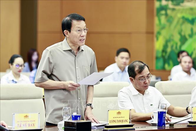 Bộ trưởng Bộ Công an Lương Tam Quang trình bày tóm tắt tờ trình. Ảnh: Doãn Tấn - TTXVN