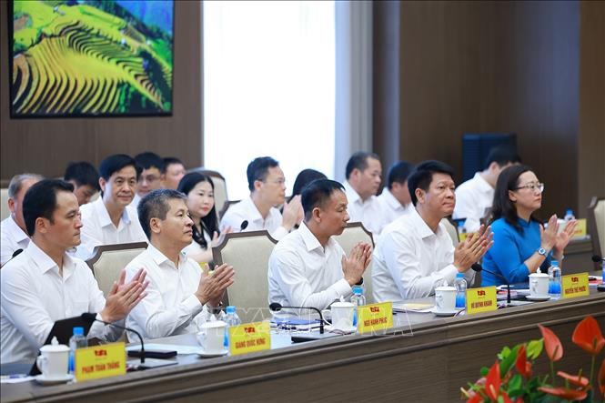 Các đại biểu tỉnh Lào Cai tham dự buổi làm việc. Ảnh: Dương Giang – TTXVN 