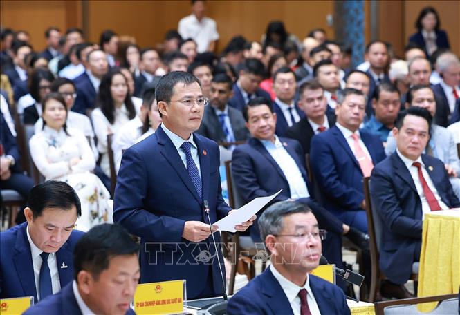 Chủ tịch kiêm Tổng Giám đốc Tập đoàn Công nghiệp - Viễn thông Quân đội (Viettel) Tào Đức Thắng phát biểu. Ảnh: Dương Giang – TTXVN 

